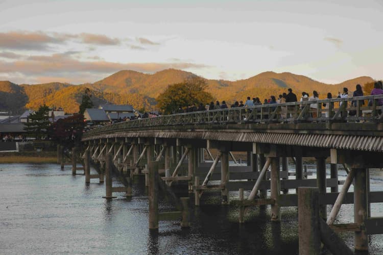 Crowded Bridge at Sunset