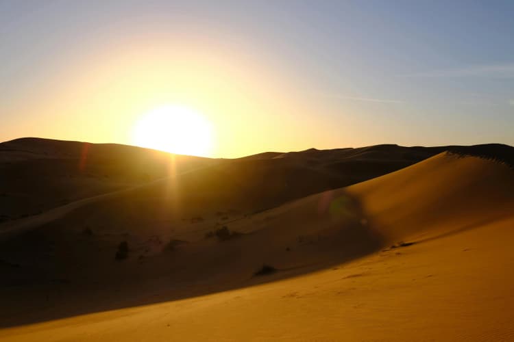 Desert Sunset Over Dunes