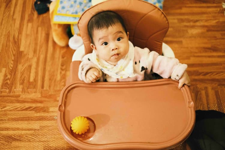 Baby in Feeding Chair