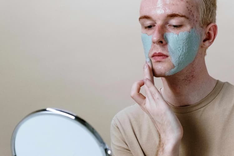 Applying Blue Face Mask