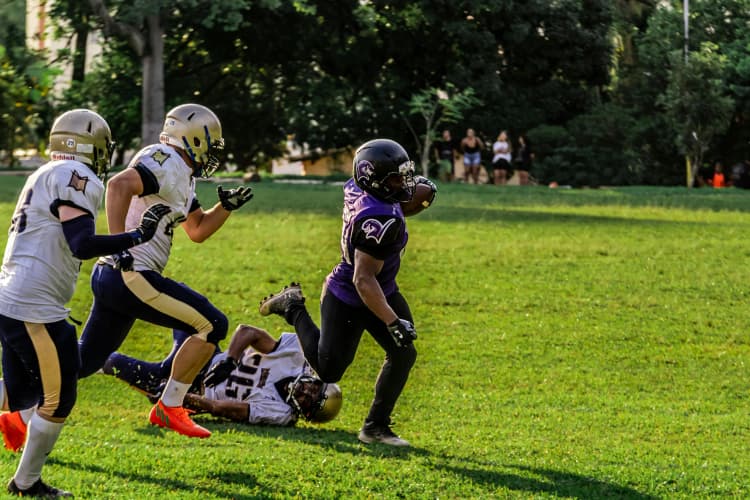 Football tackle in park