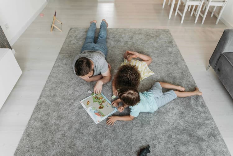 Family Reading on Carpet