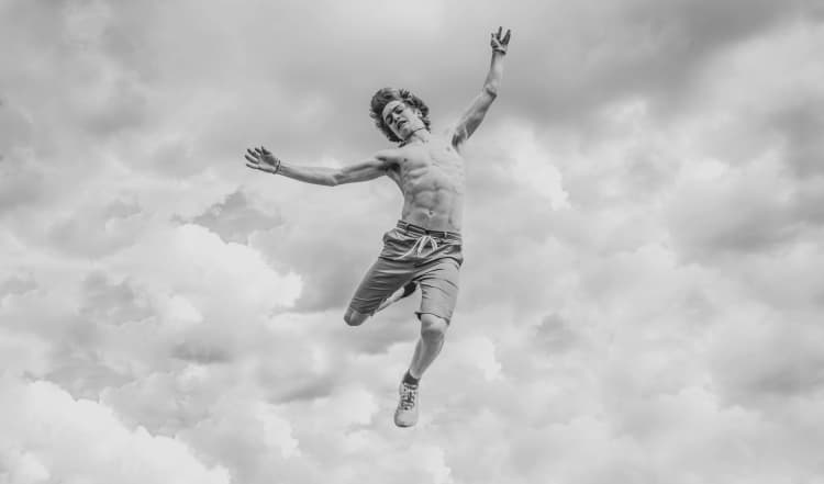 Exuberant Leap in Clouds