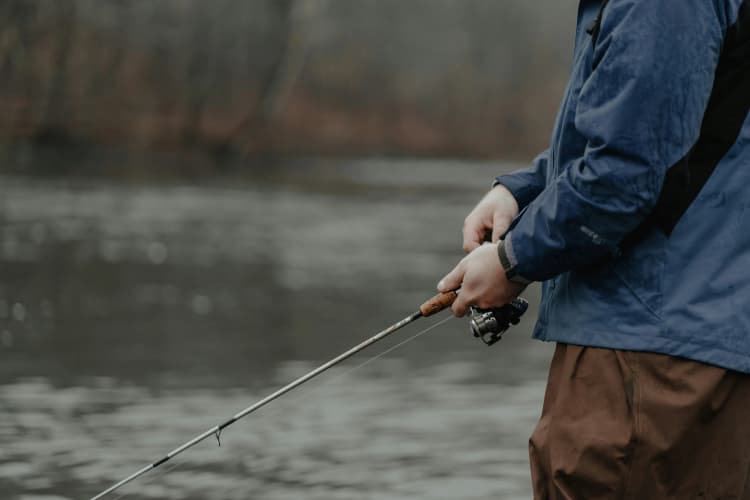 Fishing on foggy lake