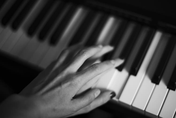 Piano hands in monochrome